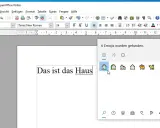 Fenster mit gefundenen Emojis, darunter Häuser und Hunde. Eine emoji tastenkombination wird hier gezeigt.