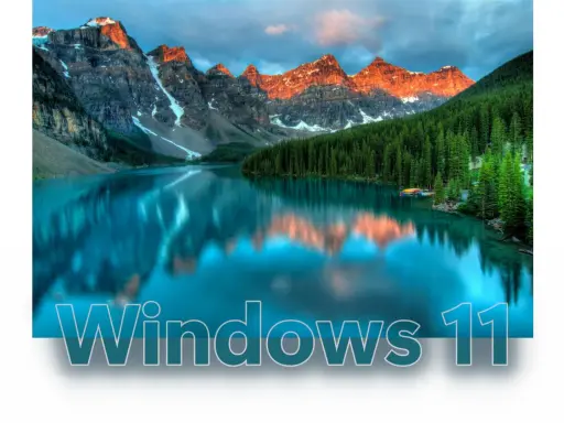 Bergsee mit Spiegelung, Wald und dem Schriftzug "Windows 11". Ein visueller Unterschied zu Windows 10.