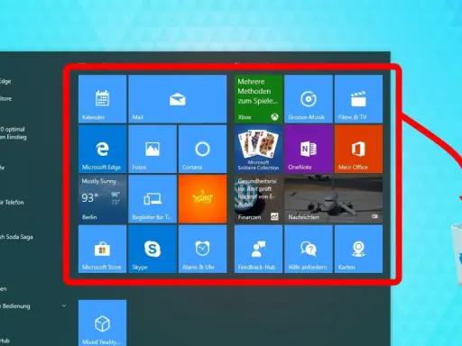Windows 11: Startmenü mit Apps, die man deaktivieren kann. Ein Pfeil zeigt auf den Papierkorb.
